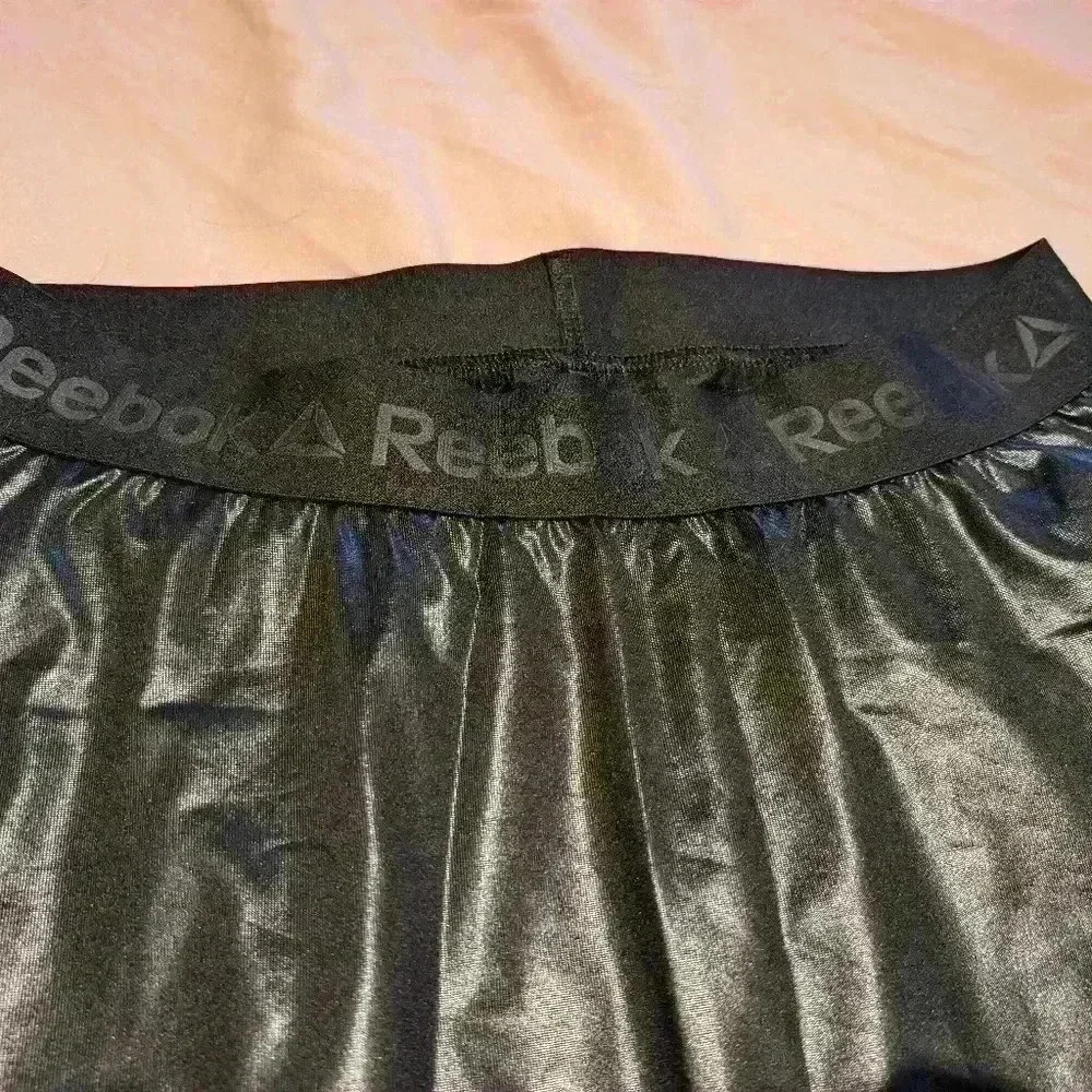 Brand new in bag size small Reebok dance Capri pants black harem pants